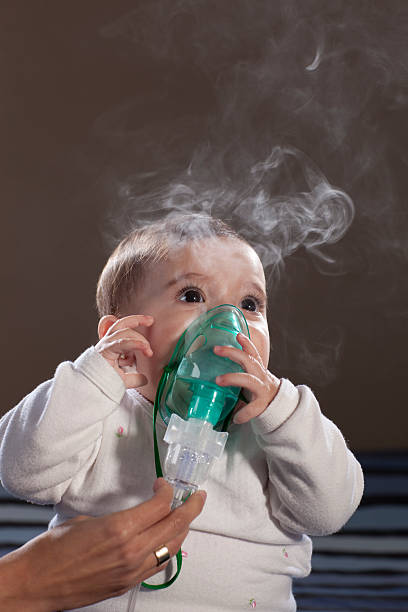 A small children suffer from pneumonia and take treatment at Santosh Homoeo Hall and Clinic