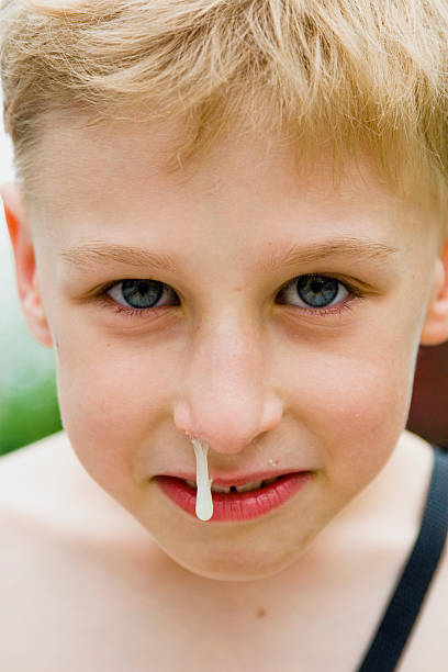 boy with nose discharge take treatment at santosh homeo hall and clinic