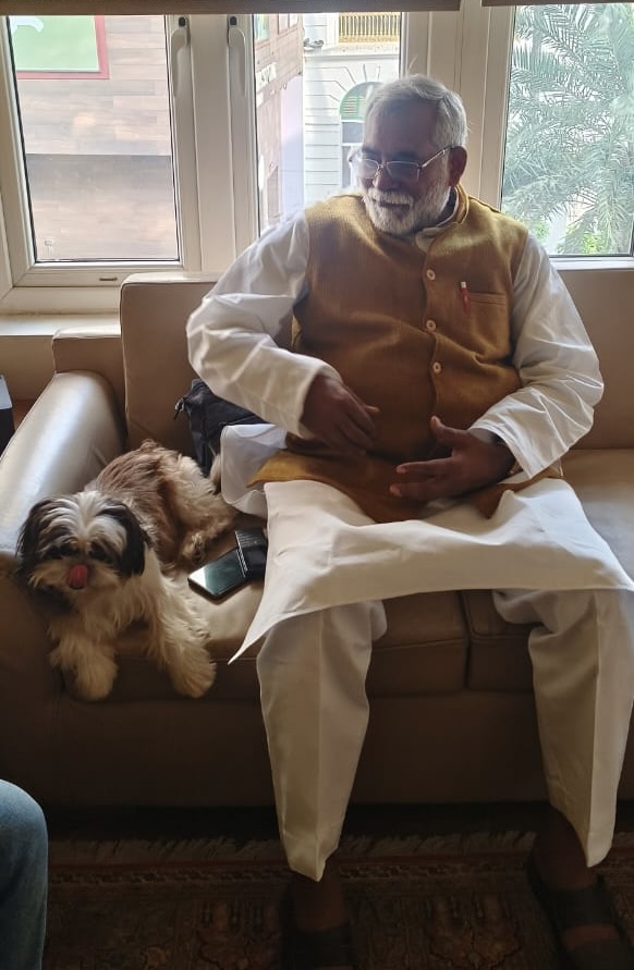 Dr. Ashok Kumar Verma a Homeopathic Doctor with a cute dog