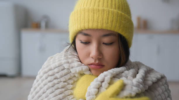 A lady wear blanket and take homeopathic treatment at Santosh Homoeo Hall and