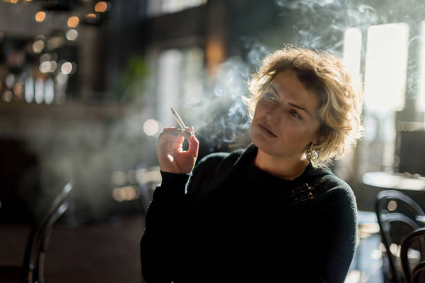 A female with smoking addiction, and take homeopathic treatment at Santosh Homoeo Hall and clinic